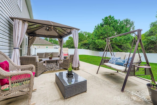 10920 Dapple Grey Ln, Charlotte, NC 28213 - fenced backyard with an outdoor living space, a gazebo, and a patio