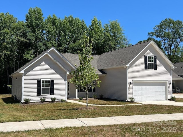 5126 Rocky River Crossing Rd, Harrisburg, NC 28075 - view of front of property with a front yard, concrete driveway, and a garage