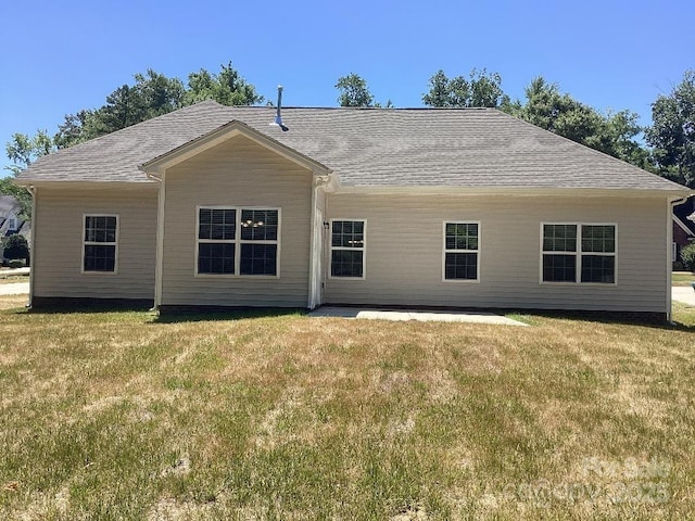 5126 Rocky River Crossing Rd, Harrisburg, NC 28075 - rear view of house with a lawn and roof with shingles