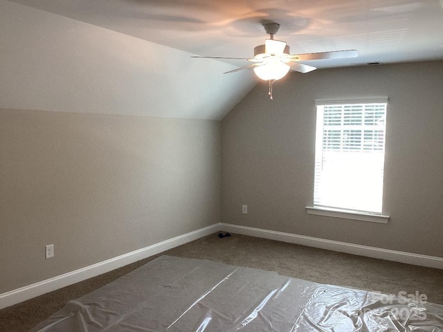 5126 Rocky River Crossing Rd, Harrisburg, NC 28075 - additional living space with ceiling fan, vaulted ceiling, and carpet flooring