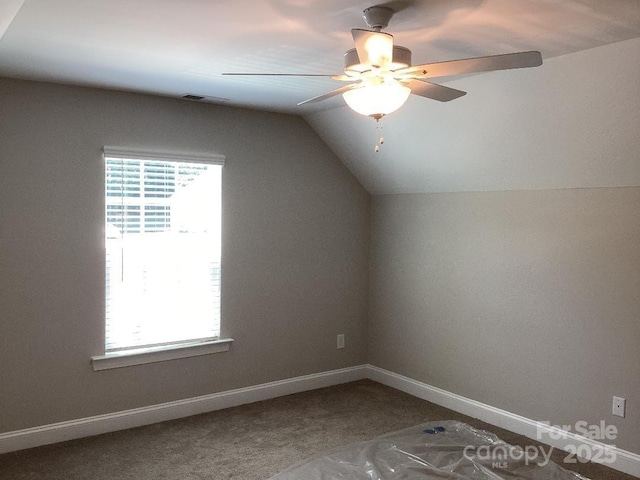 5126 Rocky River Crossing Rd, Harrisburg, NC 28075 - additional living space featuring vaulted ceiling, ceiling fan, and carpet flooring