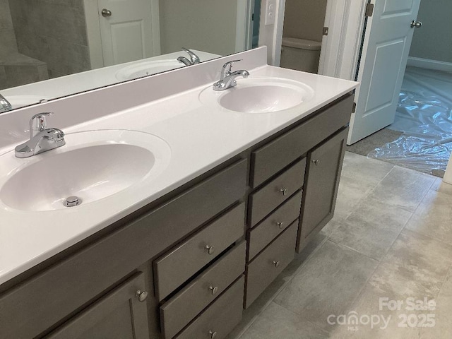 5126 Rocky River Crossing Rd, Harrisburg, NC 28075 - full bathroom featuring double vanity and toilet