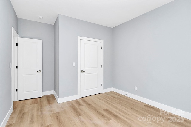 226 N Columbia Ave, Rock Hill, SC 29730 - unfurnished bedroom featuring light wood-type flooring and baseboards