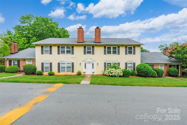 1806 Ebenezer Rd Unit E, Rock Hill, SC 29732 - view of front facade with a chimney and a front yard