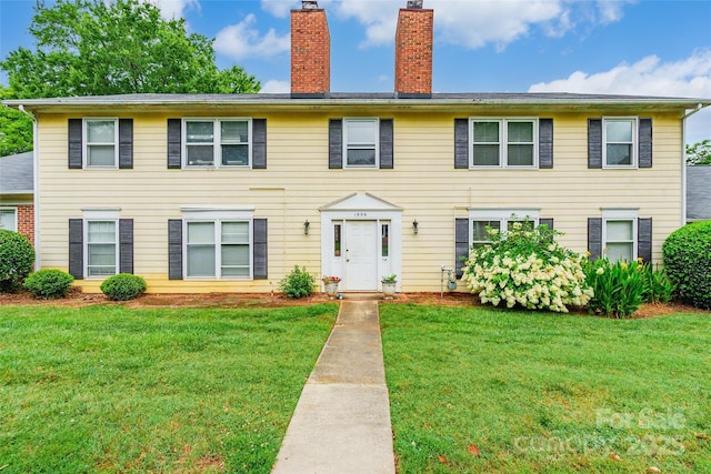 1806 Ebenezer Rd Unit E, Rock Hill, SC 29732 - colonial inspired home featuring a chimney and a front lawn