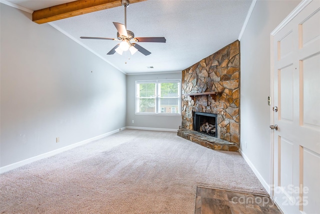 1806 Ebenezer Rd Unit E, Rock Hill, SC 29732 - unfurnished living room featuring carpet, a stone fireplace, a ceiling fan, and crown molding