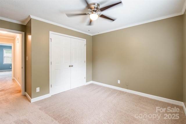 1806 Ebenezer Rd Unit E, Rock Hill, SC 29732 - unfurnished bedroom featuring light carpet, a closet, crown molding, and a ceiling fan