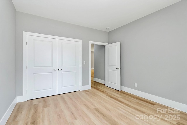 5516 Old York Rd, Rock Hill, SC 29732 - unfurnished bedroom with light wood finished floors and a closet