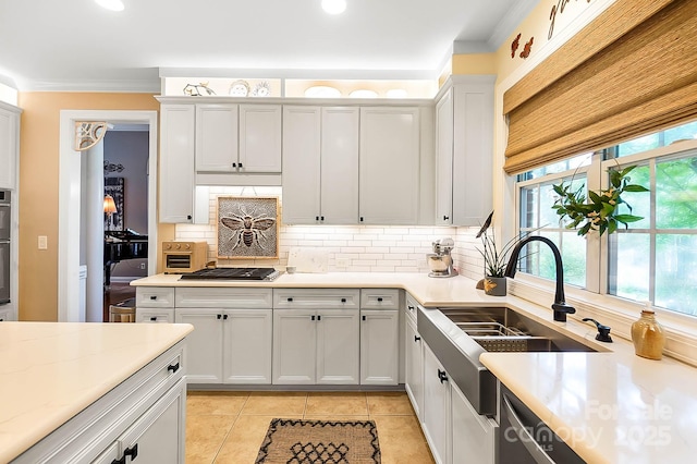 15933 Glen Miro Dr, Huntersville, NC 28078 - kitchen with decorative backsplash, stainless steel appliances, light tile patterned floors, crown molding, and recessed lighting