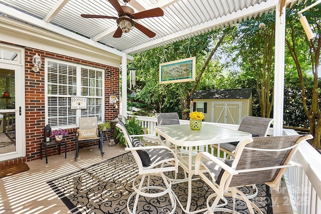 15933 Glen Miro Dr, Huntersville, NC 28078 - view of patio with outdoor dining space, a storage unit, and ceiling fan