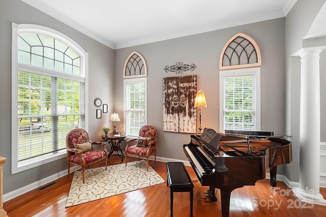 15933 Glen Miro Dr, Huntersville, NC 28078 - sitting room featuring decorative columns, hardwood / wood-style floors, and crown molding