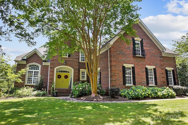 15933 Glen Miro Dr, Huntersville, NC 28078 - view of front facade with brick siding and a front yard