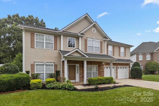 1504 Jekyll Ln, Waxhaw, NC 28173 - view of front of house featuring concrete driveway, an attached garage, and a front lawn