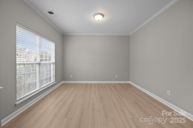 1504 Jekyll Ln, Waxhaw, NC 28173 - empty room featuring light wood-type flooring and ornamental molding