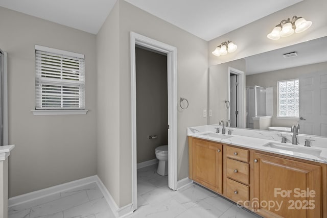1504 Jekyll Ln, Waxhaw, NC 28173 - bathroom with marble look tile flooring, double vanity, and a shower
