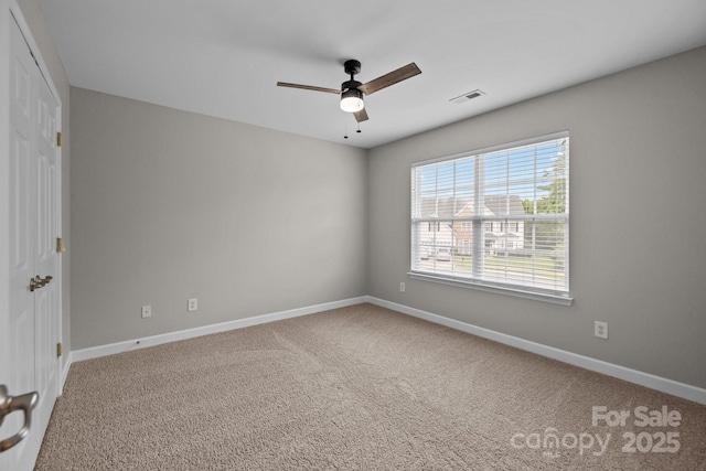 1504 Jekyll Ln, Waxhaw, NC 28173 - unfurnished bedroom featuring carpet, ceiling fan, and a closet