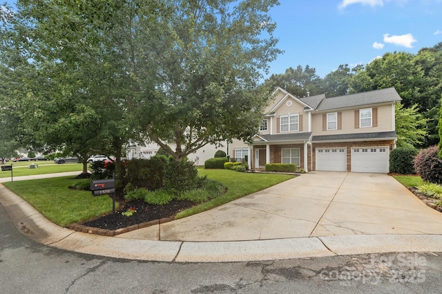 1504 Jekyll Ln, Waxhaw, NC 28173 - view of front of home featuring a garage, driveway, a front lawn, and brick siding