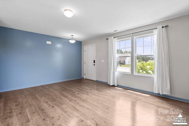 712 Coventry Dr, Albemarle, NC 28001 - unfurnished room with wood finished floors
