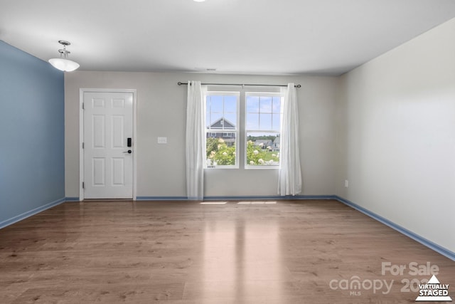 712 Coventry Dr, Albemarle, NC 28001 - foyer featuring wood finished floors and baseboards