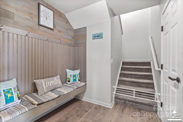 712 Coventry Dr, Albemarle, NC 28001 - mudroom with wood finished floors, vaulted ceiling, and wooden walls