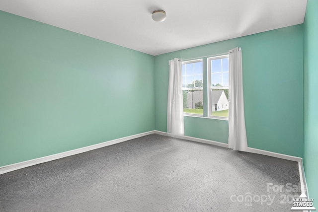 712 Coventry Dr, Albemarle, NC 28001 - carpeted spare room with baseboards