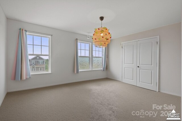 712 Coventry Dr, Albemarle, NC 28001 - unfurnished bedroom with carpet floors and a closet