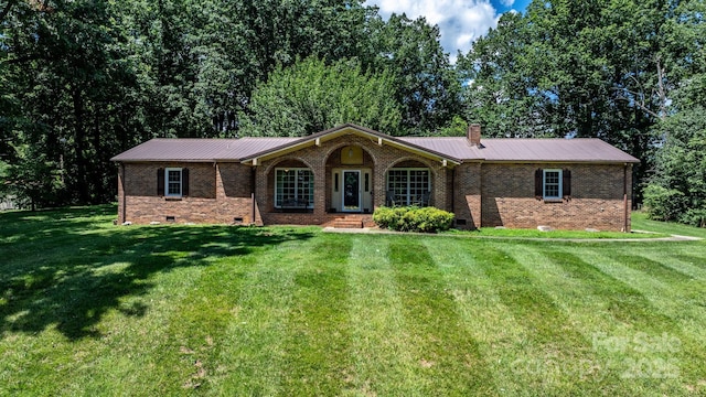 1560 Lafayette Ave, Hudson, NC 28638 - ranch-style home featuring crawl space, a front yard, brick siding, and a metal roof