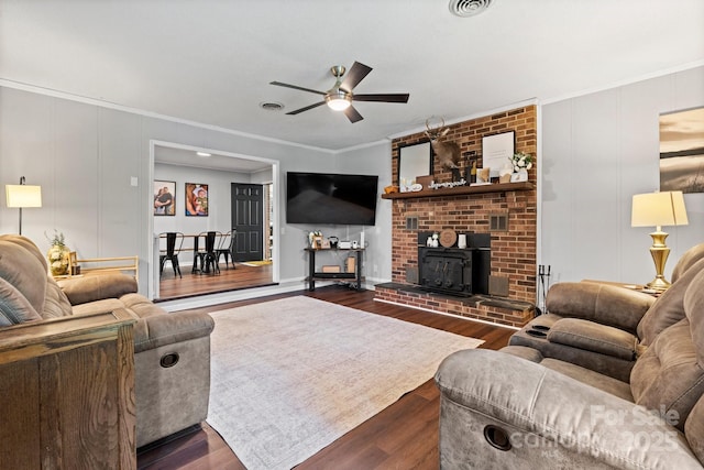 1560 Lafayette Ave, Hudson, NC 28638 - living room featuring ornamental molding, a ceiling fan, dark wood-type flooring, and a decorative wall