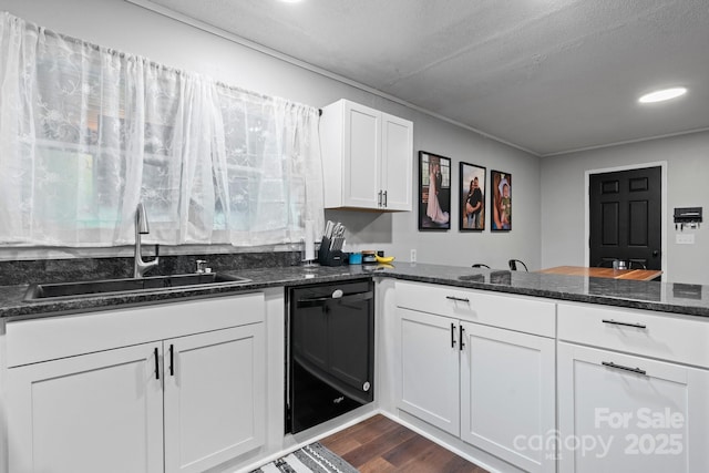 1560 Lafayette Ave, Hudson, NC 28638 - kitchen with black dishwasher, dark stone counters, white cabinetry, dark wood finished floors, and recessed lighting