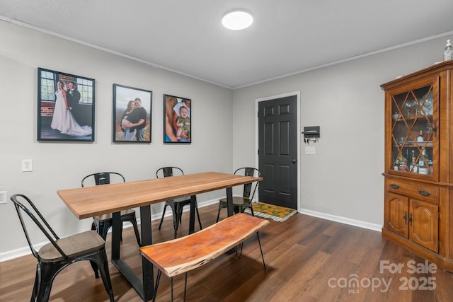 1560 Lafayette Ave, Hudson, NC 28638 - dining space with dark wood finished floors and crown molding