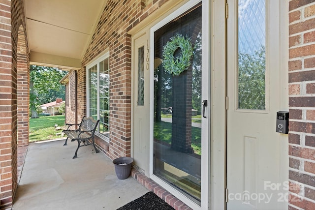1560 Lafayette Ave, Hudson, NC 28638 - entrance to property with a porch and brick siding