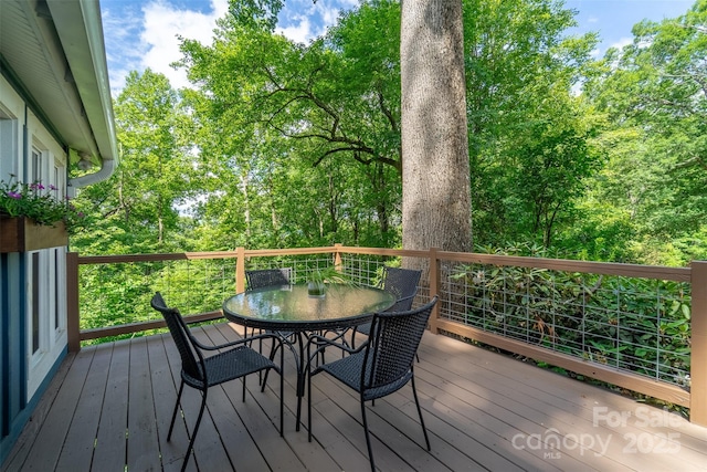 590 Claude Cook Rd, Sylva, NC 28779 - wooden deck with outdoor dining area