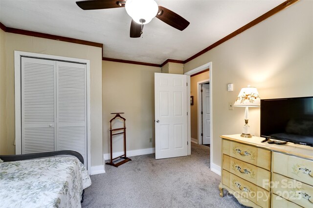 590 Claude Cook Rd, Sylva, NC 28779 - bedroom featuring light carpet, a closet, a ceiling fan, and crown molding