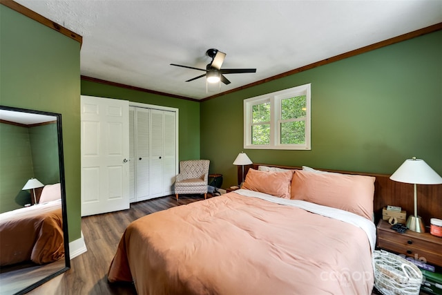 590 Claude Cook Rd, Sylva, NC 28779 - bedroom with dark wood-style floors, a closet, crown molding, and ceiling fan