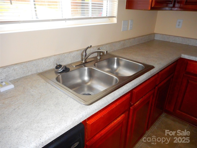 15321 Superior St, Charlotte, NC 28273 - kitchen featuring reddish brown cabinets, tile patterned flooring, and light countertops