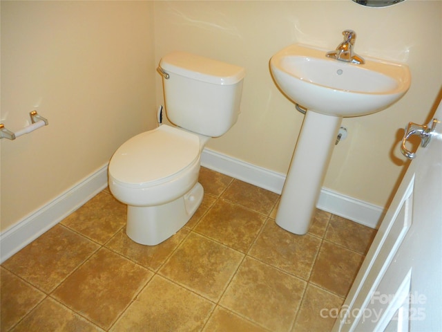 15321 Superior St, Charlotte, NC 28273 - half bathroom featuring toilet and tile patterned flooring