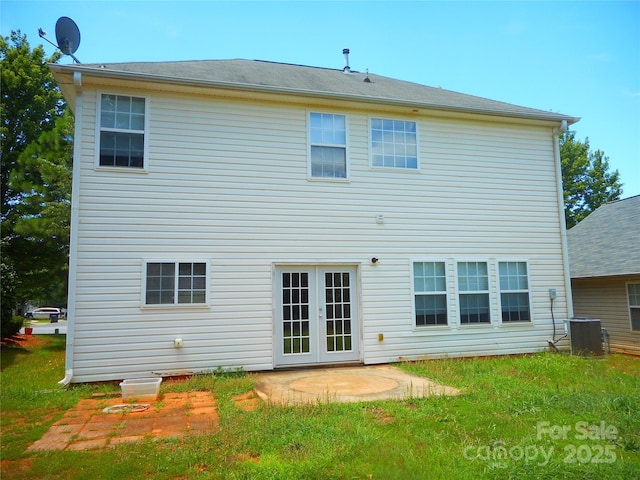 15321 Superior St, Charlotte, NC 28273 - back of property featuring french doors, a patio area, and a lawn