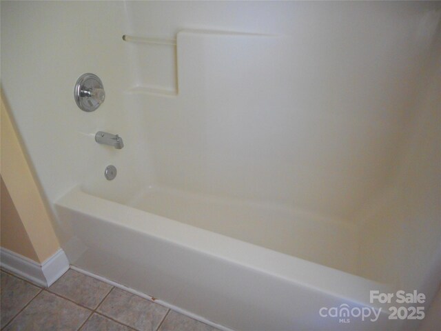15321 Superior St, Charlotte, NC 28273 - bathroom featuring tile patterned flooring and washtub / shower combination