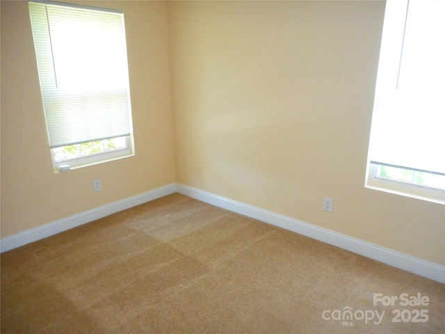 15321 Superior St, Charlotte, NC 28273 - empty room featuring light colored carpet and baseboards