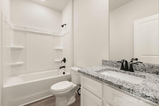 1066 Russell Dr, Winston Salem, NC 27127 - bathroom featuring wood finished floors, vanity, and  shower combination