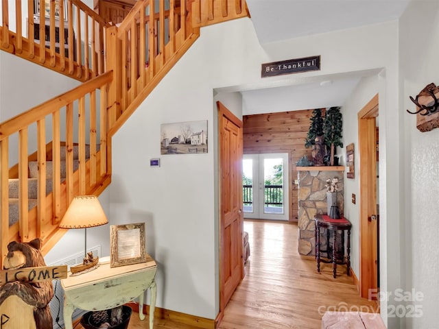1064 Point Of View Dr, Waynesville, NC 28785 - hallway featuring light wood-type flooring and stairs