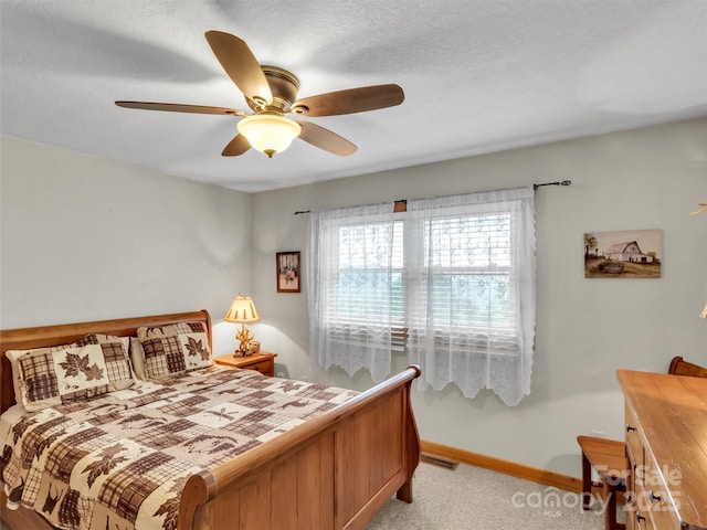 1064 Point Of View Dr, Waynesville, NC 28785 - bedroom featuring light carpet and a ceiling fan