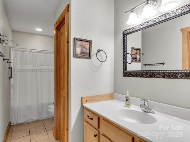 1064 Point Of View Dr, Waynesville, NC 28785 - bathroom featuring vanity, tile patterned floors, and a textured wall