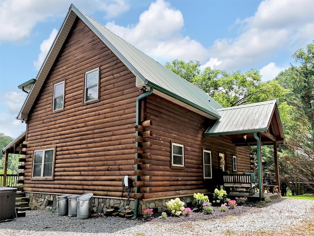 1064 Point Of View Dr, Waynesville, NC 28785 - view of side of property featuring a porch, log exterior, and a metal roof