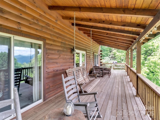 1064 Point Of View Dr, Waynesville, NC 28785 - deck featuring a mountain view and outdoor dining space