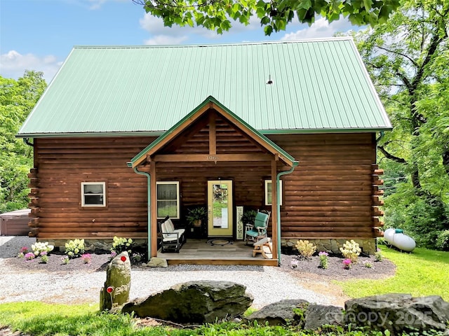 1064 Point Of View Dr, Waynesville, NC 28785 - view of front of property with a porch, log exterior, and a metal roof