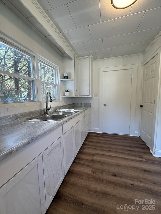 727 3rd Ave NW, Hickory, NC 28601 - kitchen with white cabinetry, dark wood-style flooring, open shelves, ornamental molding, and light countertops