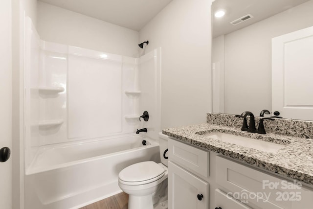1070 Jonestown Rd, Winston Salem, NC 27127 - bathroom featuring vanity, washtub / shower combination, and wood finished floors