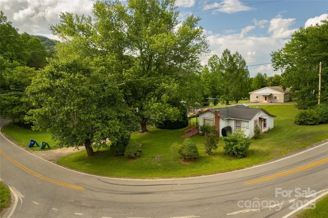 153 Beaverdam Loop Rd, Candler, NC 28715 - aerial view of property and surrounding area with a tree filled landscape