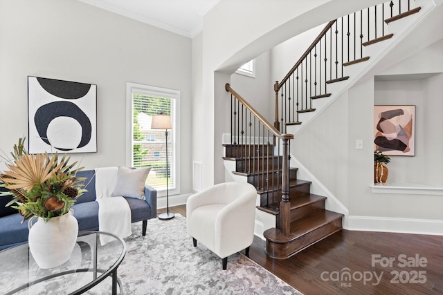 805 Hidden Pond Ln, Waxhaw, NC 28173 - living area featuring wood finished floors, stairway, and crown molding